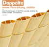 Close-up view of the cross-section of a beige PVC fence slat, showing its internal structure and ribbed texture. Podgląd zdjęcia produktu