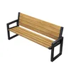 A modern park bench with wooden slats and black metal legs, shown from a slightly elevated diagonal angle against a white background. Anteprima dell’immagine prodotto