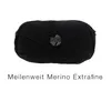 A ball of black yarn on a white background. Produktbild-Vorschau