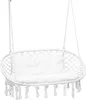 A white macrame hanging chair with a white cushion, suspended by ropes. Produktbild-Vorschau