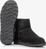 A pair of black BEARPAW Alyssa boots shown from the side and sole view against a white background. Produktbild-Vorschau
