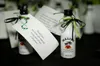 Miniature bottles of Malibu rum with gift tags, likely for a party or wedding favor. Náhled obrázku produktu