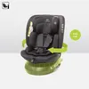 A black car seat is shown on a light gray and white background, with green arrows indicating rotation and a green grid highlighting the base. Podgląd zdjęcia produktu