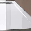 A close-up view of a white rectangular shower tray with a metallic drain. Produktbild-Vorschau