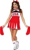 A woman in a cheerleader costume posing with pom-poms. Produktbild-Vorschau
