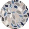 A round rug with a leaf pattern. Náhľad obrázku produktu