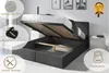 A bed with its storage compartment open, showcasing its features. Produktbild-Vorschau