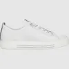 A side view of a white sneaker against a light gray background. Anteprima dell’immagine prodotto