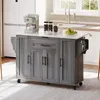 A kitchen island with a coffee maker and fruit on top, in a kitchen setting. Anteprima dell’immagine prodotto