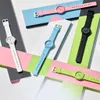 A collection of colorful Casio watches arranged on a geometric background. Produktbild-Vorschau