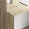 A close-up view of a desk with a wood grain finish and a white drawer. Náhled obrázku produktu