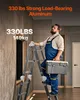 A man in a blue jumpsuit is standing on a multi-purpose ladder, holding a toolbox. Náhled obrázku produktu