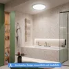 A modern bathroom with a bathtub, shower, and vanity. Anteprima dell’immagine prodotto