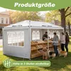 A white gazebo set up outdoors, displaying dog treats on shelves, with people and dogs interacting. Voir les images du produit