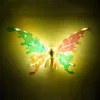 A close-up shot of a butterfly-shaped accessory with LED lights. Náhľad obrázku produktu