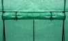 Close-up view of the rolled-up door of a green greenhouse. Produktbild-Vorschau