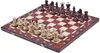 A wooden chess set with pieces arranged on the board. Produktbild-Vorschau