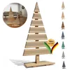 A wooden Christmas tree alternative displayed on a white background, with a circular inset showing a living room scene with similar trees. Podgląd zdjęcia produktu