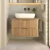 A modern bathroom vanity with a vessel sink and a towel hanging from the side. Produktbild-Vorschau