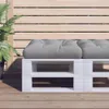 A close-up of a pallet bench with grey cushions on a wooden deck, with a slatted wooden fence in the background. Produktbild-Vorschau