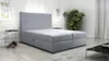 A grey continental bed with storage drawers in a modern bedroom setting. Podgląd zdjęcia produktu