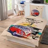 A bedding set with a VW Bulli van design, placed on a bed in a room. Náhled obrázku produktu