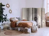 A bedroom scene with a bed, plants, and a room divider. Produktbild-Vorschau