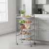 A kitchen cart filled with groceries and produce in a kitchen setting. Voir les images du produit