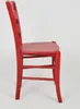A side view of a red wooden chair. Podgląd zdjęcia produktu