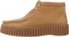 Side view of a brown clog. Voir les images du produit