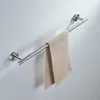 A towel hanging on a brushed nickel towel bar mounted on a light gray wall. Podgląd zdjęcia produktu