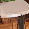 A close-up of an outdoor furniture cushion with a zipper partially open, resting on a rattan chair and wooden decking. Anteprima dell’immagine prodotto