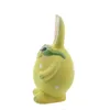A yellow ceramic Easter bunny figurine with white polka dots and green accents is shown from the side against a white background. Produktbild-Vorschau