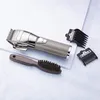 A cordless hair clipper with accessories on a light-colored surface. Anteprima dell’immagine prodotto