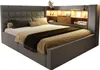 A modern L-shaped bed with integrated shelving and lighting. Podgląd zdjęcia produktu