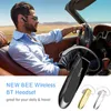 A man driving a convertible car while wearing a Bluetooth headset. Produktbild-Vorschau