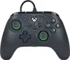 A black Xbox controller with green accents and a decorative pattern on the top. Produktbild-Vorschau
