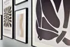 A wall with several framed art prints displayed. Produktbild-Vorschau