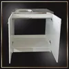 A white kitchen cabinet with a stainless steel sink and an open door, set against a black background with a decorative border. Náhľad obrázku produktu