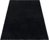A black shaggy rug is shown from a slightly elevated angle against a white background. Produktbild-Vorschau