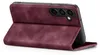 A burgundy flip case for a smartphone is shown from a diagonal angle, with the front cover open. Produktbild-Vorschau