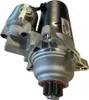 A close-up, angled view of a car starter motor. Anteprima dell’immagine prodotto