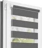 A close-up view of a dark gray and white striped roller blind installed in a white window frame. Produktbild-Vorschau