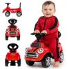 A baby sitting on a red ride-on car, with other views of the car shown in smaller images. Produktbild-Vorschau