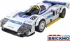 A white and blue Lego-style model of a Mazda 787B race car with the number 18 on it, displayed on a white background. Voir les images du produit