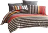 A neatly arranged bedding set with a striped pattern. Produktbild-Vorschau