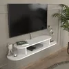 A white floating TV stand with a TV mounted above it, in a room setting. Podgląd zdjęcia produktu