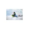 A child is sledding down a snowy hill on a green and black sled. Podgląd zdjęcia produktu