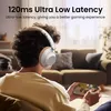 A person wearing headphones and playing a game on a smartphone in a living room. Voir les images du produit