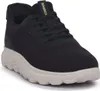 A single black sneaker with a light gray sole is shown against a white background. Voir les images du produit
